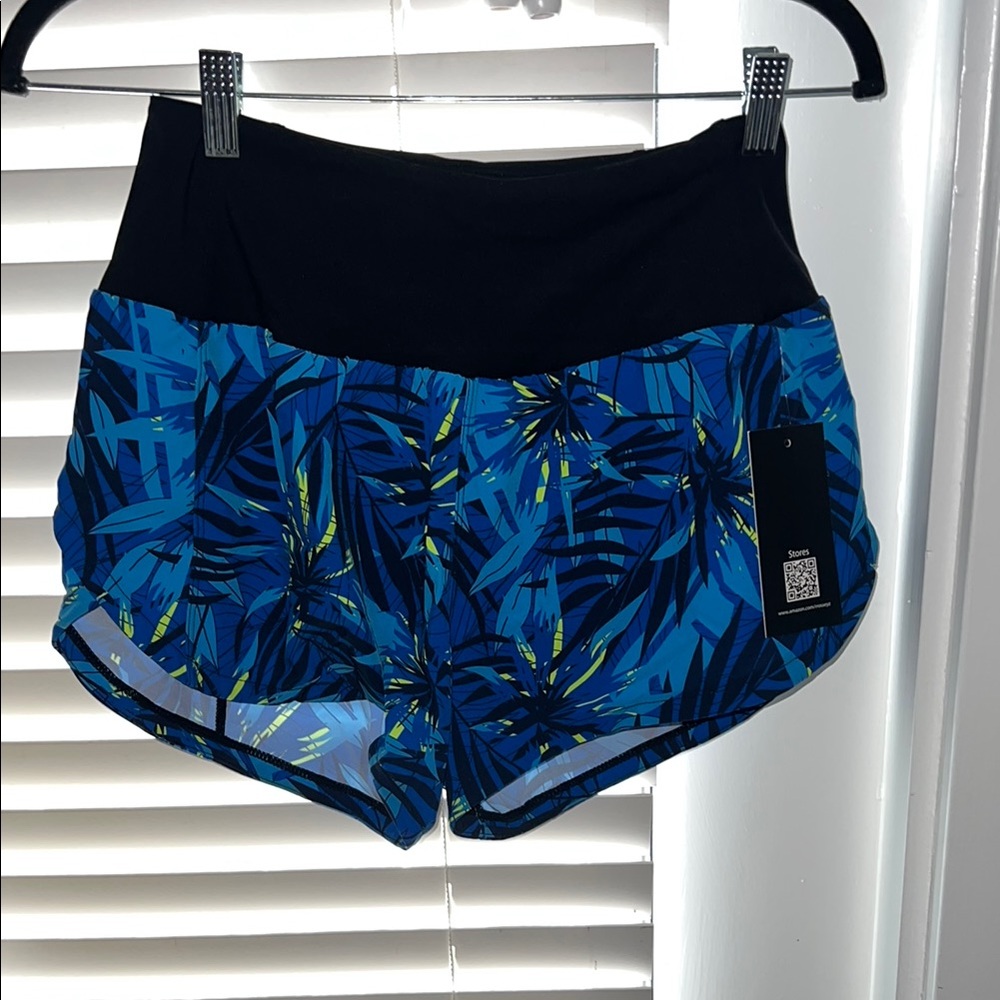 Blue and Black Athletic Shorts with Floral Design